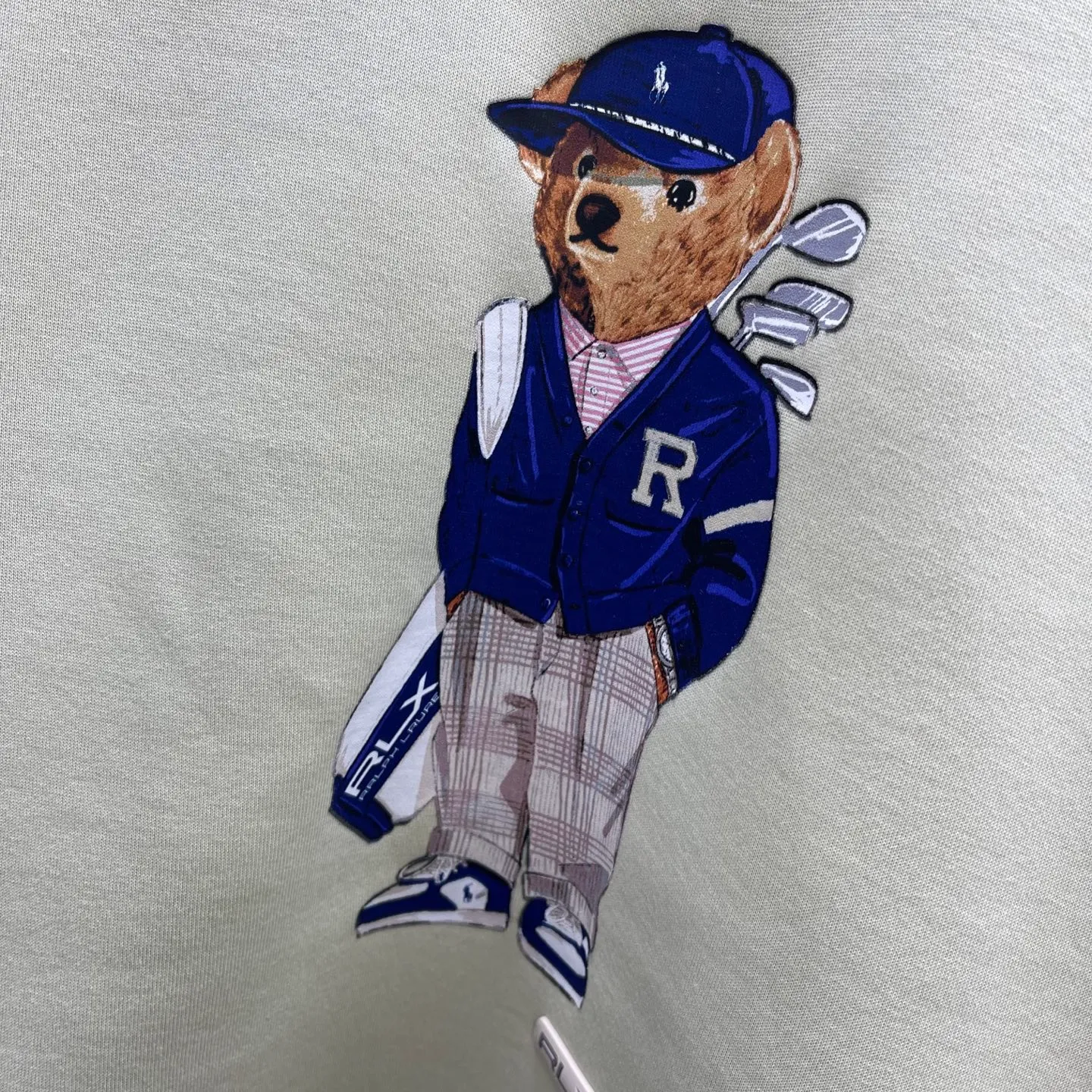 P350 🧧LRX Ralph Lauren Bear Sweatshirt Size: S-XL Carefully made in Italy, this sweatshirt is decorated with an elegant Polo Bear patch that reflects Purple Label's relentless pursuit of craftsmanship. Our beloved mascot is wearing this season's Purple Label collection suit on the patch. The bear's entire outfit is made from actual fabrics from the collection, including the pinstripe Kent jacket, Gregory The trousers and matching spectator shoes feature refined details such as a sewn-in drawstring at the ends and a jersey-lined hood.